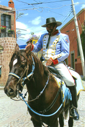 Mexican policeman costumed in the uniform of their local hero, Ignatio Allende